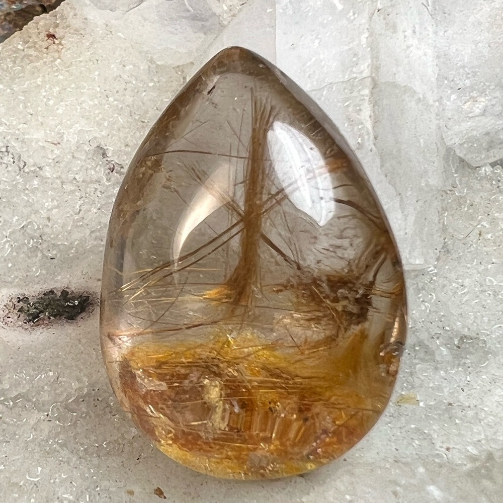 Natural smoky titanium rutilated quartz cabochon